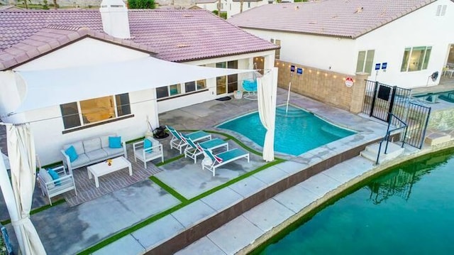 view of pool featuring a patio