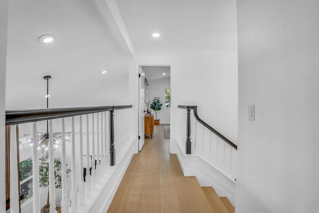 hall with light wood-type flooring