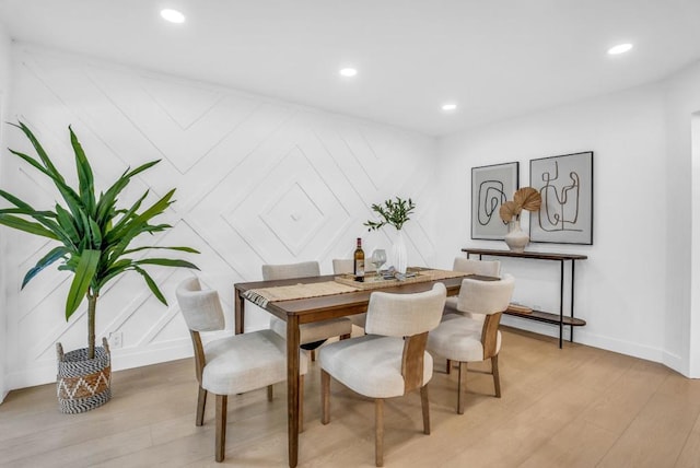 dining space featuring light hardwood / wood-style flooring