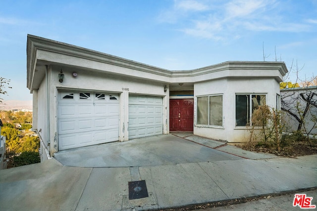 view of front of property featuring a garage