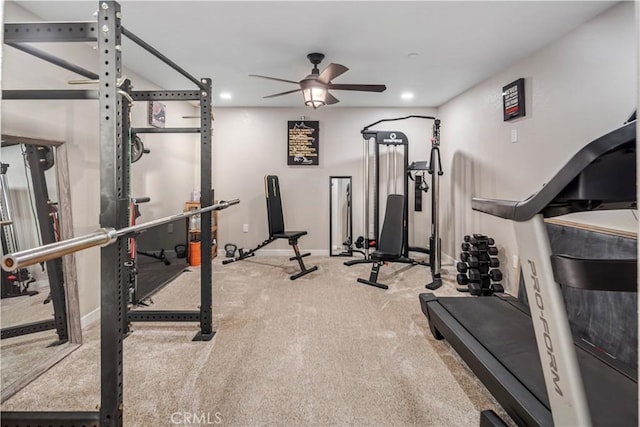 workout area featuring ceiling fan and carpet floors