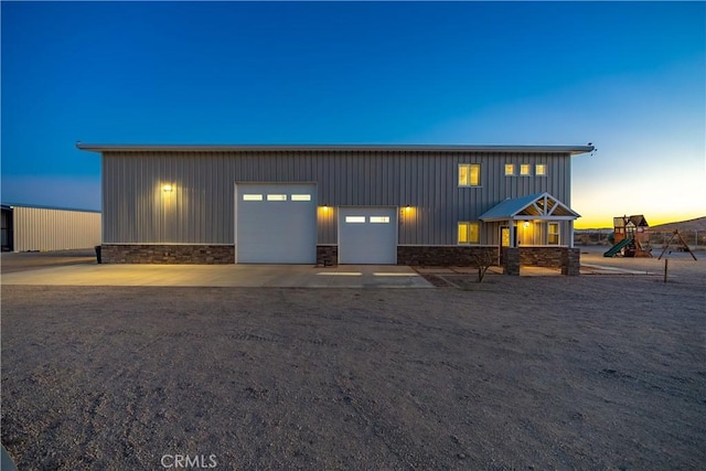 view of front of property with a garage