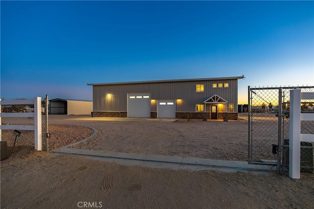 view of front of home with a garage