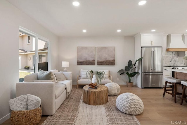 living room featuring light wood-type flooring