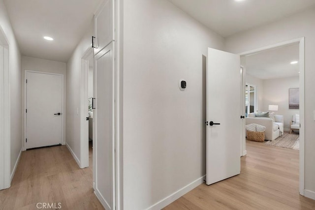 hall featuring light hardwood / wood-style flooring