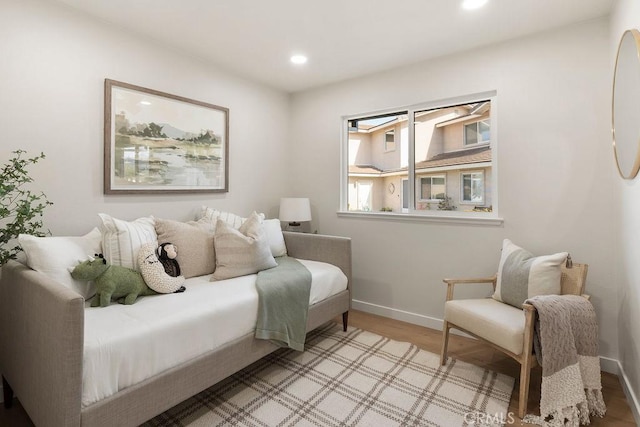 bedroom with light hardwood / wood-style floors