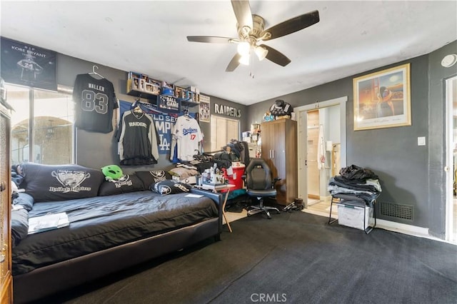 bedroom featuring ceiling fan