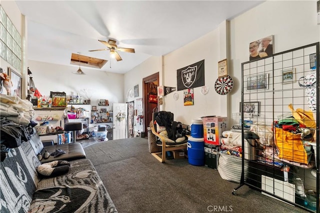 miscellaneous room with ceiling fan and carpet flooring