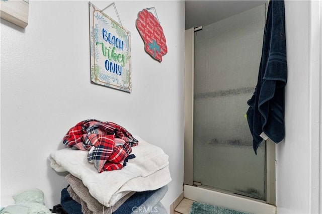 bathroom with an enclosed shower