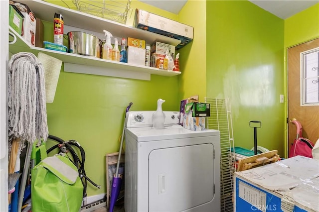 clothes washing area featuring washer / clothes dryer