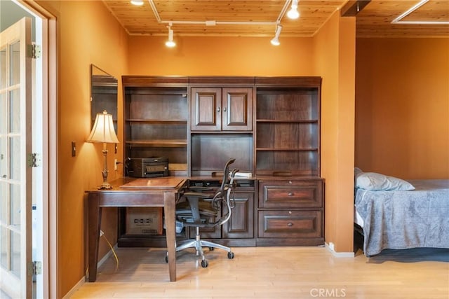 office area featuring rail lighting, wooden ceiling, and light hardwood / wood-style flooring