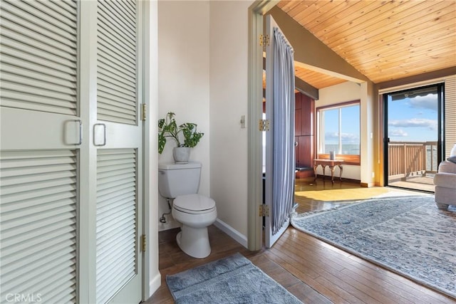 bathroom with wood-type flooring, wooden ceiling, and vaulted ceiling