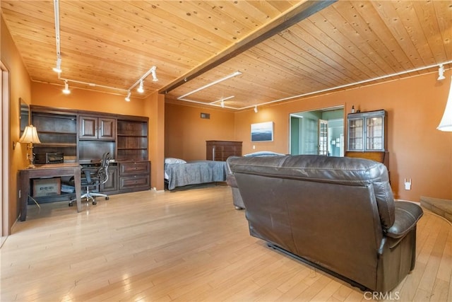 living room with rail lighting, wood ceiling, and light hardwood / wood-style floors