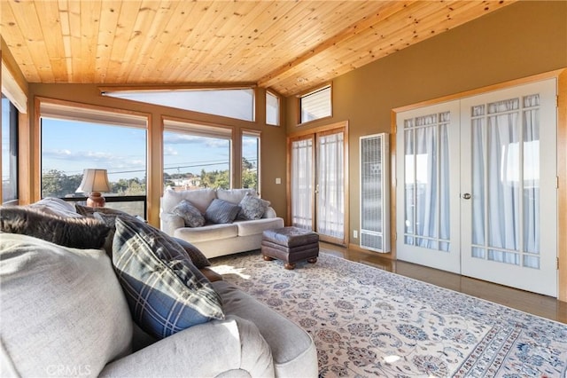 sunroom / solarium featuring wood ceiling, vaulted ceiling, and french doors