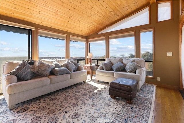 living room featuring hardwood / wood-style flooring, vaulted ceiling, and wood ceiling