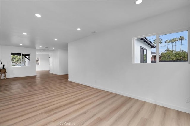 unfurnished living room with light hardwood / wood-style floors