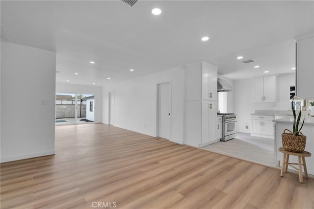 living room with light hardwood / wood-style floors