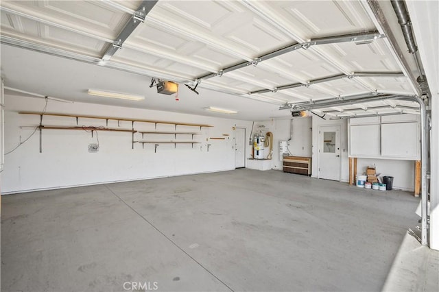 garage featuring a garage door opener and water heater