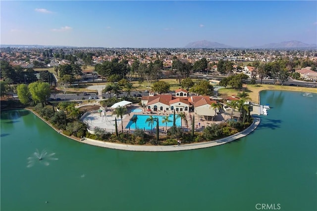 bird's eye view featuring a water and mountain view