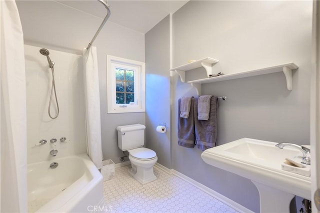 full bathroom with shower / bath combo, sink, and toilet