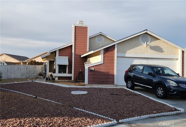 view of front of home featuring a garage