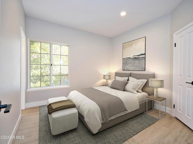 bedroom featuring light hardwood / wood-style flooring