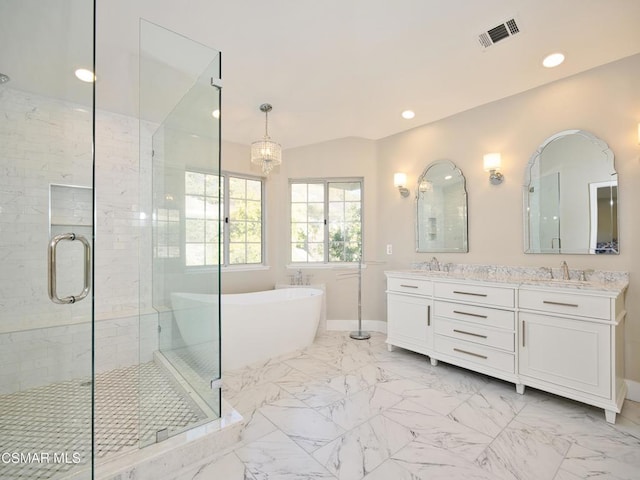 bathroom with plus walk in shower, lofted ceiling, and vanity