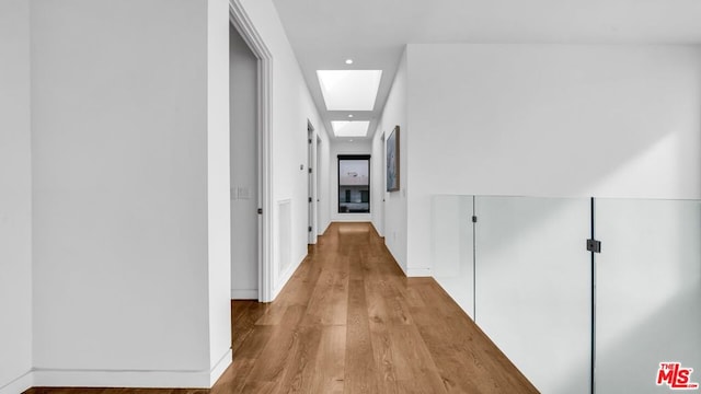 corridor featuring light wood-type flooring