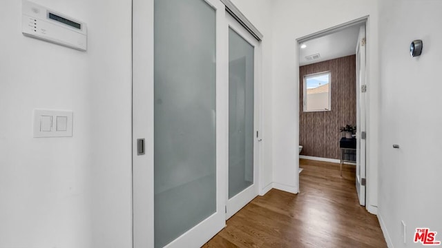 hall featuring hardwood / wood-style floors