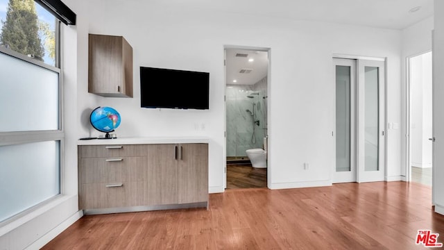 unfurnished living room featuring light hardwood / wood-style flooring