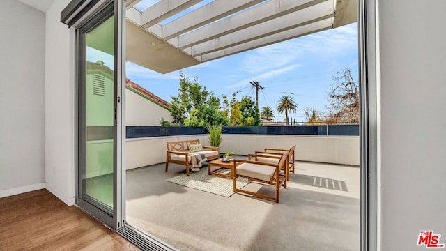 exterior space featuring an outdoor hangout area