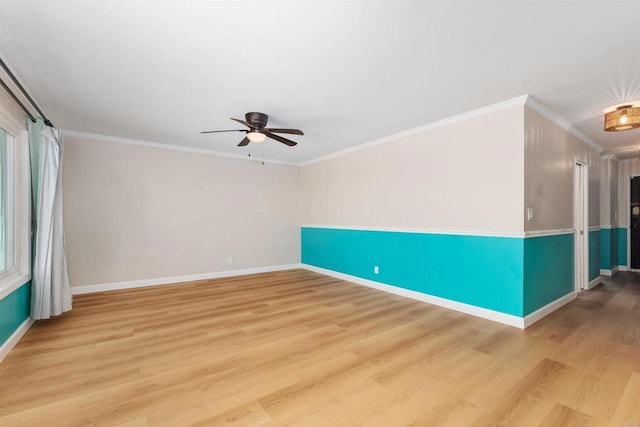 unfurnished room with ceiling fan, ornamental molding, and light wood-type flooring