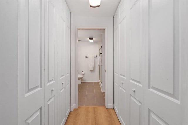 hallway featuring light hardwood / wood-style flooring