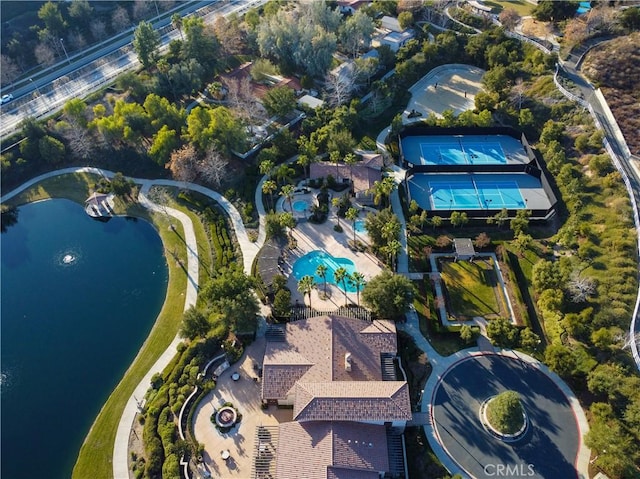 bird's eye view with a water view