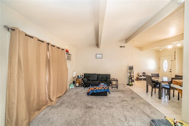 playroom with a wall mounted air conditioner, beam ceiling, and tile patterned floors