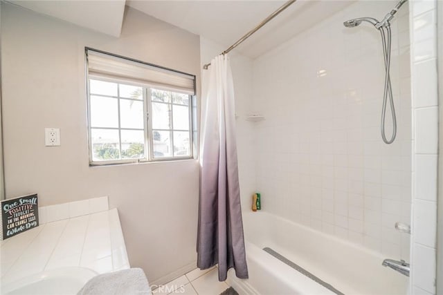 bathroom with tile patterned flooring and shower / bathtub combination with curtain