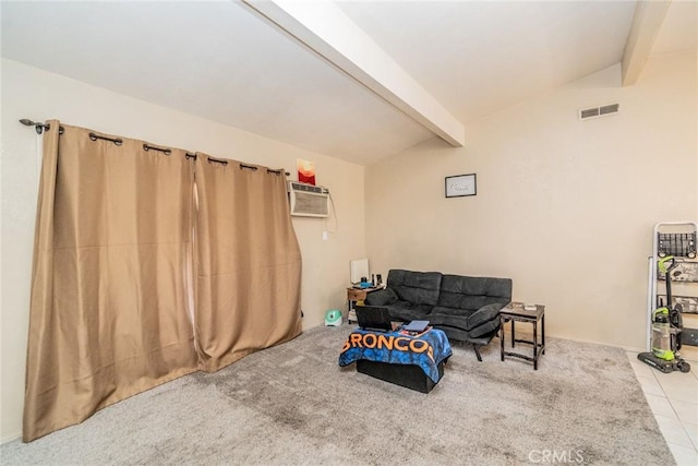 sitting room featuring a wall mounted air conditioner, light tile patterned floors, and lofted ceiling with beams