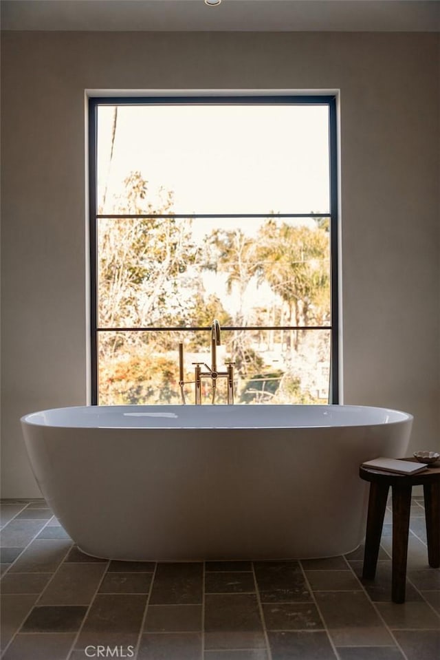 bathroom with a tub