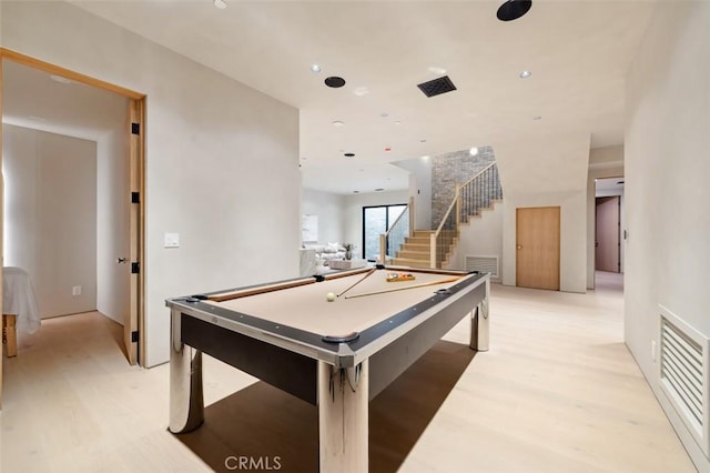 game room featuring pool table and light hardwood / wood-style floors