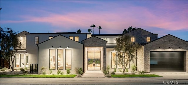 view of front of house with a garage