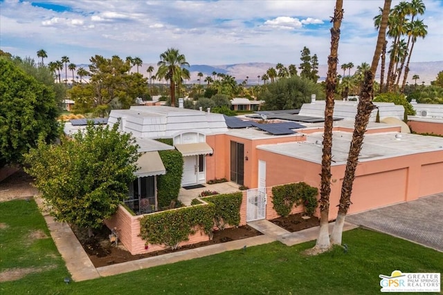 view of front of house with a mountain view