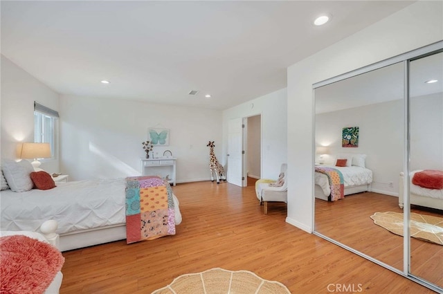 bedroom featuring wood-type flooring