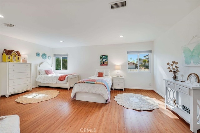 bedroom featuring light wood-type flooring