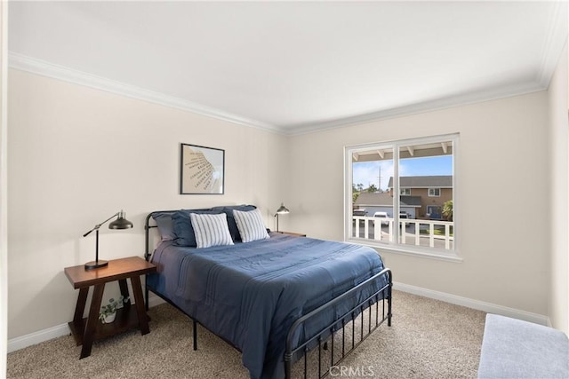 carpeted bedroom with ornamental molding