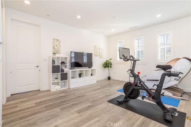 workout room with light wood-type flooring