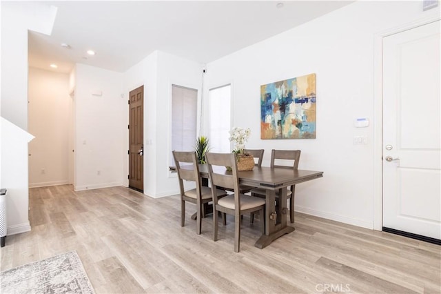 dining area featuring light hardwood / wood-style flooring