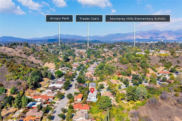 drone / aerial view featuring a mountain view