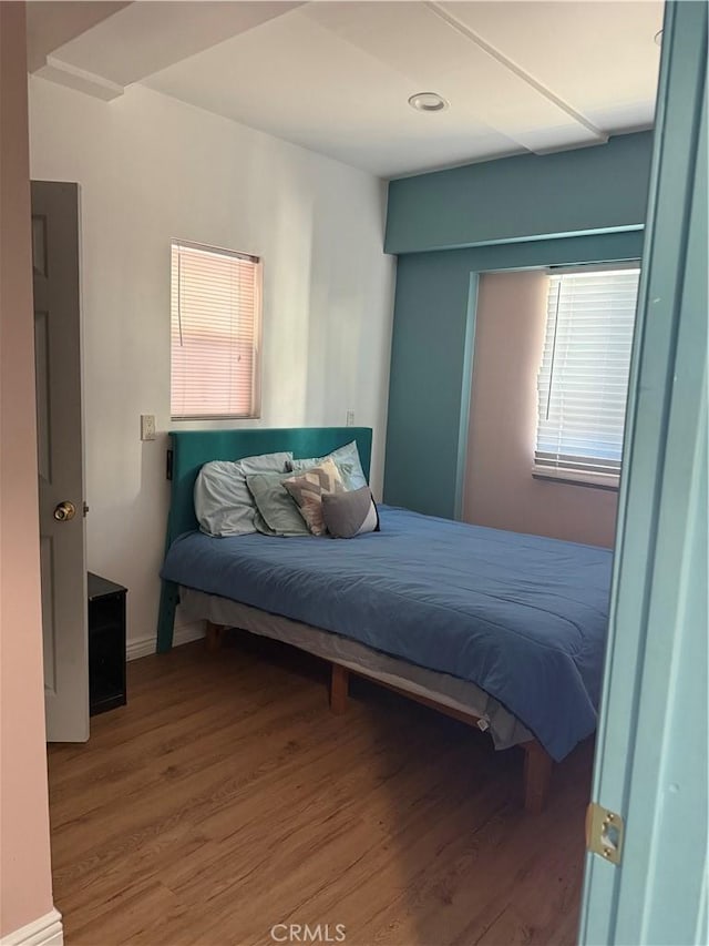 bedroom featuring hardwood / wood-style flooring