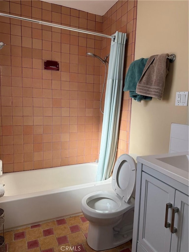 full bathroom with vanity, shower / bath combination with curtain, and toilet