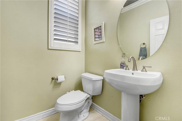 bathroom with sink and toilet